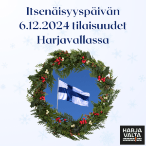 Kuvassa havuseppele, jonka keskellä Suomen lippu.